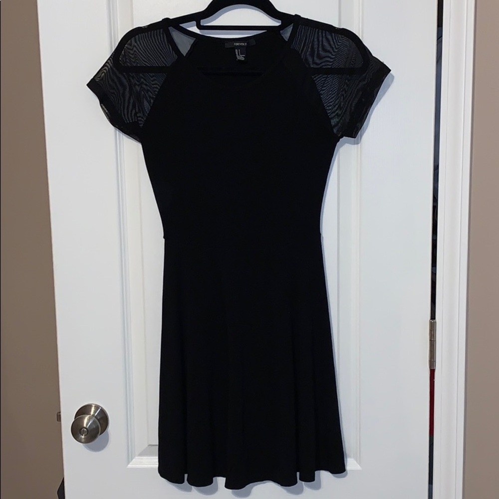 Black skater dress with sheer sleeves
